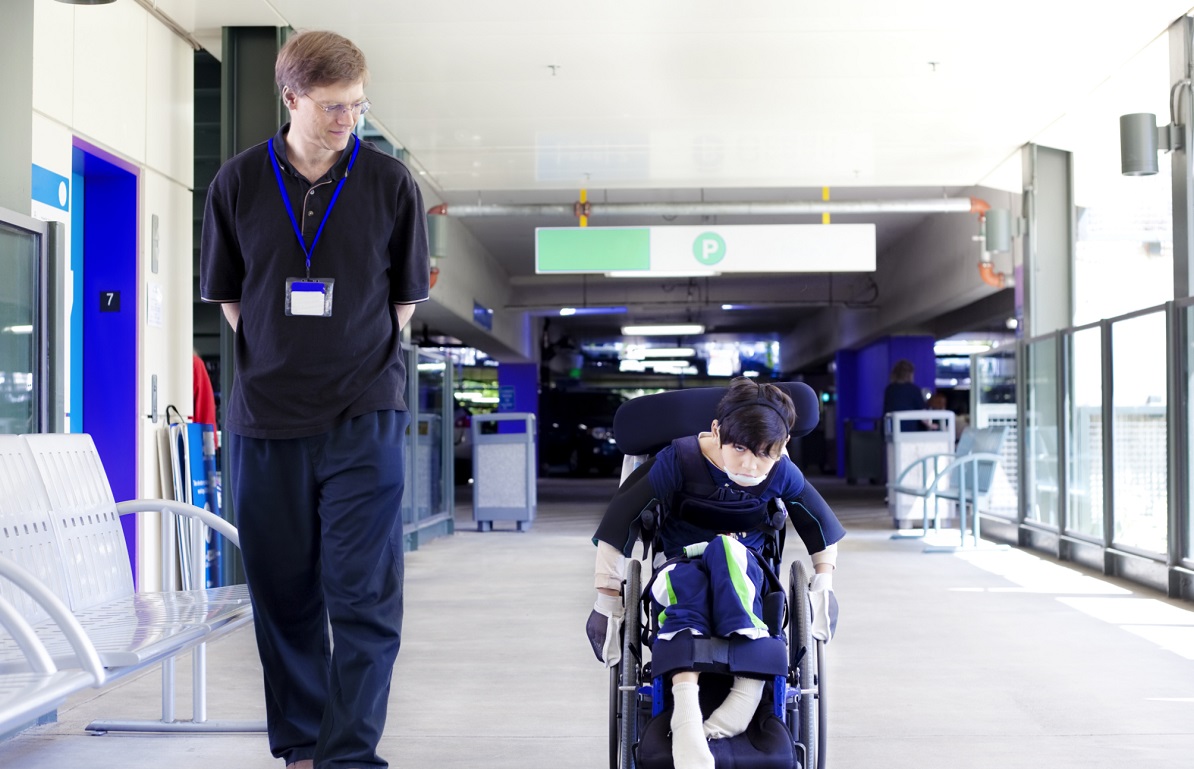 man with child in hospital